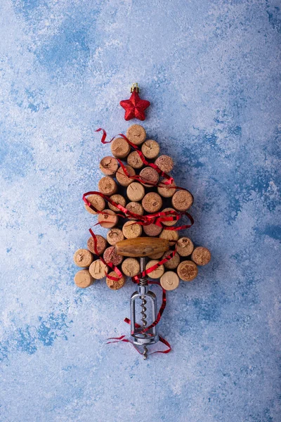 Christmas tree made from wine bottle corks with red decoration