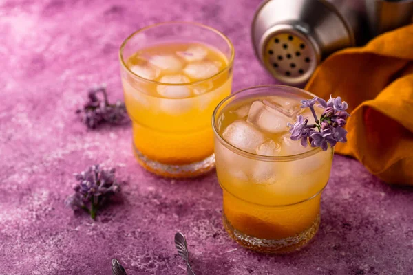 Summer cocktail or mocktail with mango juice and ice