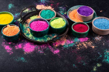 Gulal colors in bowl for celebrating Indian Holi festival