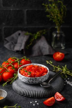 Homemade tomato sauce with spice and herbs clipart