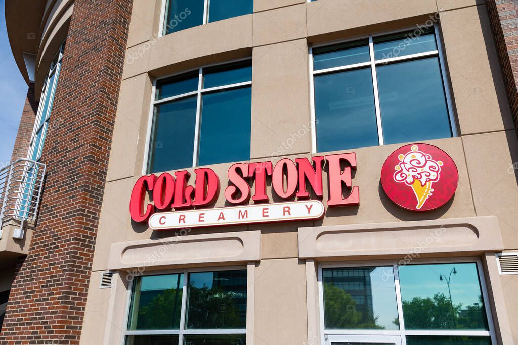 Rogers, AR - May 2023: Cold Stone Creamery store that serves Ice Cream based desserts.