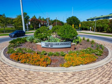 Tallahassee, FL - September 2, 2024: Sign for Florida Agricultural and Mechanical University, commonly known as Florida A&M, is a public historically black university in Tallahassee, Florida. clipart