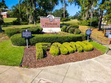 Tallahassee, FL - September 2, 2024: Sign for Florida Agricultural and Mechanical University, commonly known as Florida A&M, is a public historically black university in Tallahassee, Florida. clipart