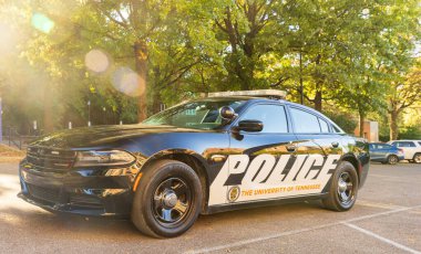 Knoxville, TN - October 11, 2024: University of Tennessee police vehicle on campus. clipart