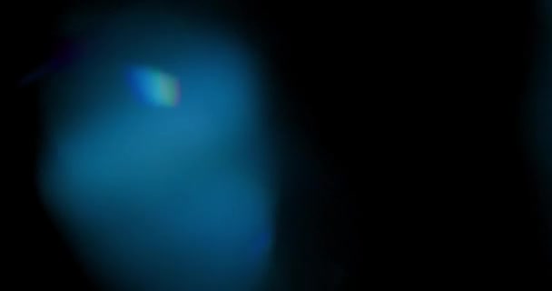 Lente Llamarada Luces Bokeh Abstractas Movimiento Reflejo Filtrante Cristal Sobre — Vídeos de Stock