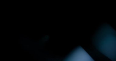 White elegant Light Leak overlay on black background. Spherical Optical Prism Light abstract background 4K. High quality 4k footage