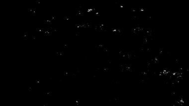 Old damaged abstract grunge surface on black background. Retro vintage effect. High quality 4k footage