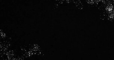 Old damaged abstract grunge surface on black background. Retro vintage effect. High quality 4k footage