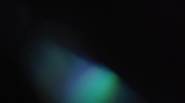 Hafif organik sızıntılar arka plan animasyon stok görüntülerini etkiler. Mercek ışığı etrafta yanıp sönüyor ve soyut bir arka plan animasyonu oluşturuyor. 4K 'de klasik ışık sızıntısı. Yüksek kalite 4k görüntü