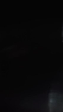 Dikey Bokeh Işık Sızdıran Lens Parıltısı Kaplaması. Yüksek kalite 4k görüntü