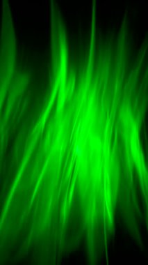 Canlı ve dinamik yeşil soyut ışık bulutsusu desenleri, bir ruhani atmosfer ve ruh hali yaratıyor. Yüksek kalite 4k görüntü