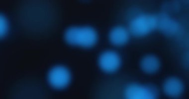 Çarpıcı mavi bokeh efektleriyle büyüleyici soyut bir arka plan, tasarım projeleri ve amaçları için ideal.
