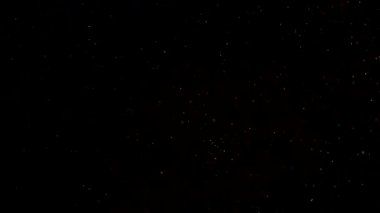 Havada süzülen parçacıklar, yumuşak ağır çekim etkisi. Yüksek kalite 4k görüntü