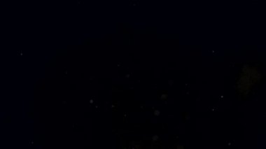 İnce atmosferik parçacıklar yavaşça sürükleniyorlar. Yüksek kalite 4k görüntü