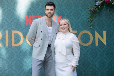 MILAN, ITALY - 09 Mayıs: Luke Newton ve Nicola Coughlan, 