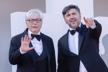 VENICE, ITALY - SEPTEMBER 05: Nino D'Angelo and his son Toni D'Angelo attend the premiere of the movie 