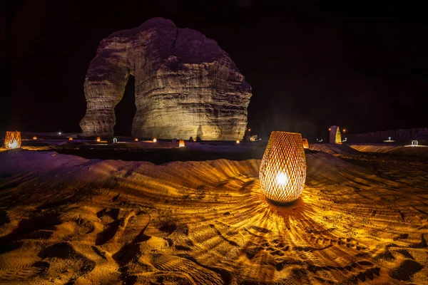 stock image Illuminated sandstone elephant rock erosion monolith standing in the night desert, Al Ula, Saudi Arabia