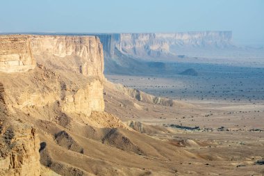 The Jabal Tuwaiq Mountains, with desert below landscape, Riyadh, Saudi Arabia clipart