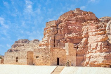 Al Ula old town street with castle walls on the hill, Medina province, Saudi Arabia clipart