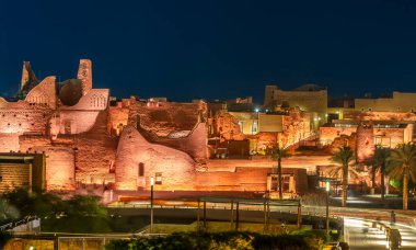 Diriyah illuminated  old town walls, At-Turaif district complex at night, Riyadh, Saudi Arabia clipart