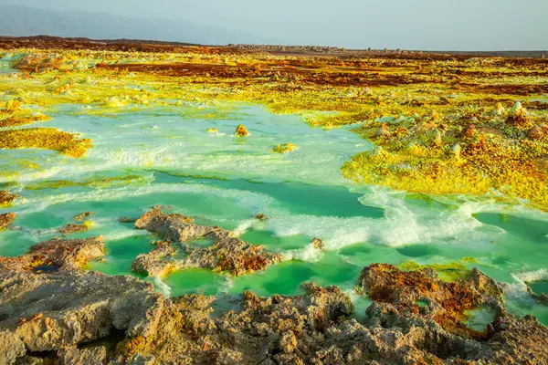 stock image Colorful volcanic landscape with toxic lakes and sulphur minerals, Danakil Depression desert, Afar region, Ethiopia