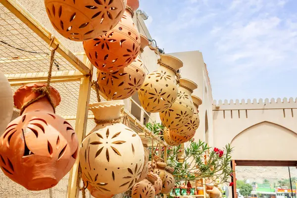 stock image Hanging handmade pottery jugs trade on the street of Nizwa, Sultanate Oman