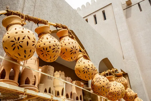 stock image Hanging handmade pottery jugs trade on the street of Nizwa, Sultanate Oman