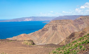 Ghoubbet al-Kharab sea gulf lake panorama with mountains in the background, Tajourah Djibouti clipart