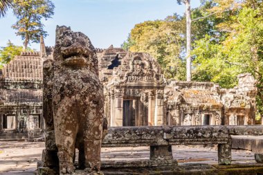 Hindu Banteay Kdei khmer  ruined temple with ancient statues guard the entrance, Angkor Archaeological Park, Siem Reap, Cambodia clipart