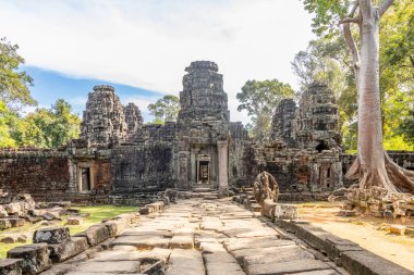 Ancient hindu Banteay Kdei khmer  ruined temple lost in jungle, Angkor Archaeological Park, Siem Reap, Cambodia clipart