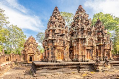 Hidden in jungles hindu Banteay Srei khmer ruined temple inner yard, Angkor Archaeological Park, Siem Reap, Cambodia clipart