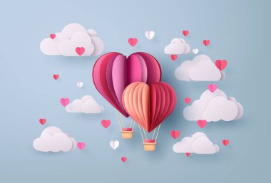 Aşk ve Sevgililer Günü, Origami sıcak hava balonu yaptı. Mavi gökyüzünde bulut, fotokopi alanı, tebrik kartı ile. Kağıt kesimi sanat tarzı..