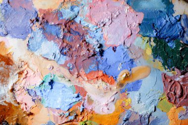 Renkli soyut doku. Sanat paletinde yağlı boya kokusu var. Modern sanat okulunun konsepti. Yaratıcı bir çalışma. Yılın Renkleri 2023 