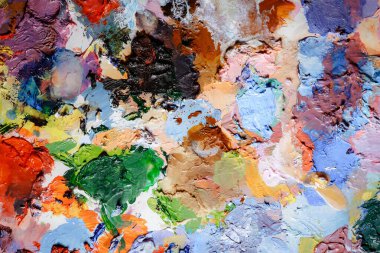 Renkli soyut doku. Sanat paletinde yağlı boya kokusu var. Modern sanat okulunun konsepti. Yaratıcı bir çalışma. Yılın Renkleri 2023 