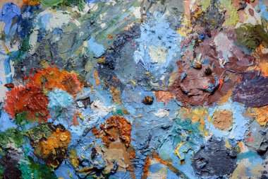 Renkli soyut doku. Sanat paletinde yağlı boya kokusu var. Modern sanat okulunun konsepti. Yaratıcı bir çalışma. Yılın Renkleri 2023 