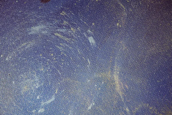 Painted linen texture. Strokes of oil paint on a textured canvas. The concept of the modern school of art. Fragment of creative work.