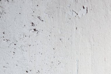 background for copy space. texture of concrete wall with cracks and scratches 