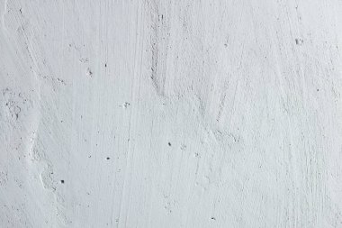 Çatallı duvar. Çizikli hafif beton çimento dokusu, kopyalama alanı için arkaplan 