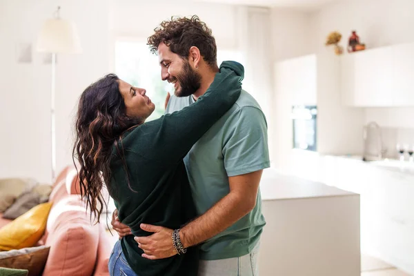 Relocation Concept Smiling Cheerful Multiracial Couple Embraces Lookin Each Other — Foto Stock