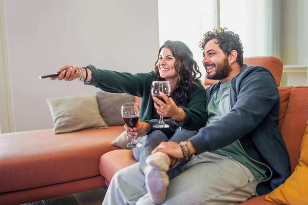 Loving Couple Drinking Wine Watching Sitting Couch Holding Remote Control — Foto Stock