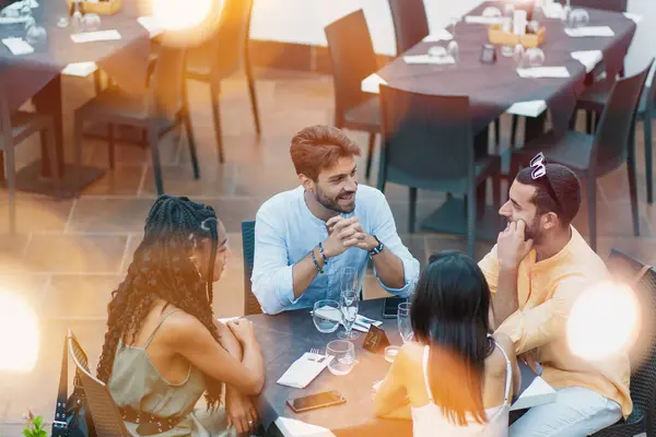 Multicultural Group Friends Gathers Outdoor Setting Sharing Laughter Conversation Seated — Stock Photo, Image
