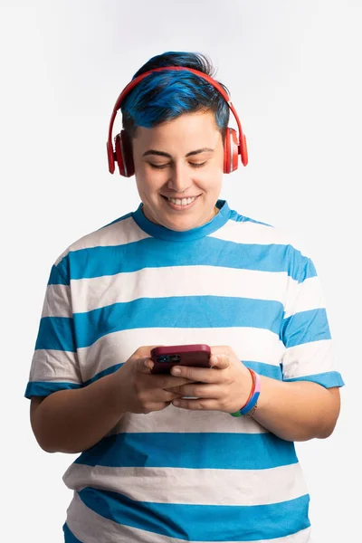 Non Binary Person Vibrant Blue Hair Wearing Headphones Listens Music — Stock Photo, Image