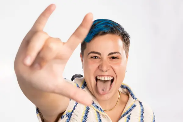 Non Binary Person Blue Hair Gives Rock Roll Sign Playfully — Stock Photo, Image