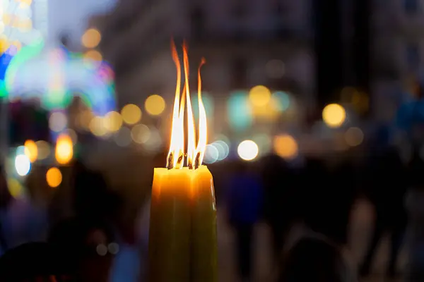 Candle Burns Brightly Bokeh City Lights Symbolizing Faith Tradition Feast — Stock Photo, Image