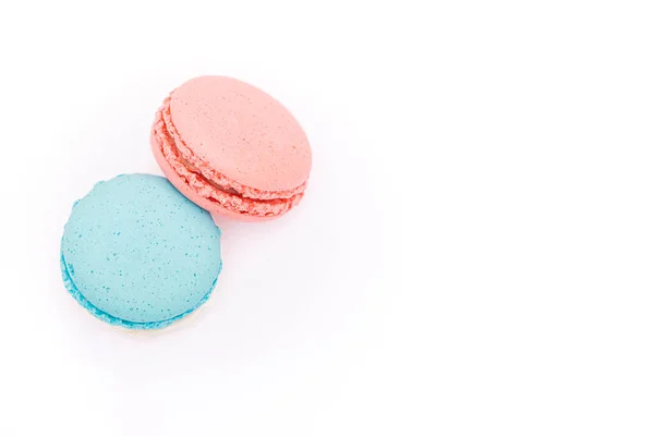 Macaroons, baked sweets from the pastry shop on white background