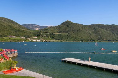 Kaltern, South Tyrol, Italy 05 September 2023 Lake Caldaro Kalterer See on sunny summer day.  clipart