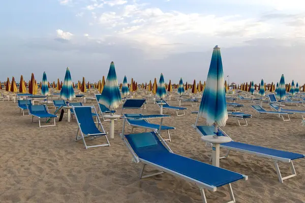 Empty deck chairs in early morning at Rivazzurra, Rimini Italy.