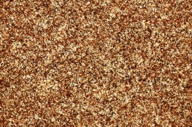 Bronz doku. Parlak kahverengi desenli. Grunge pirinç arka planı. Parlak malzeme arka planı. Bakır metal levha. 