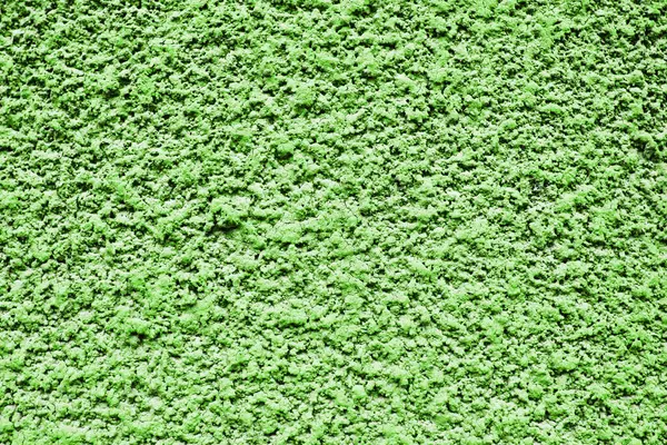 Ön cephe dokusu. Yeşil kaba yüzey. Çamur taneleri. Duvardaki taşları kırdım. Evin dış dekorasyonu. Stucco duvar deseni.