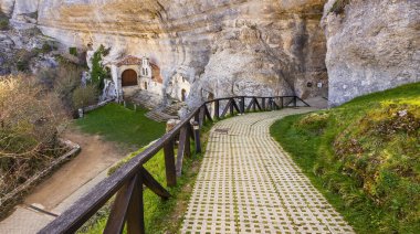 Hermitage of San Bernabe, Natural Monument of Ojo Guarena, Ojo Guarea Karst Complex, Las Merindades, Burgos, Cantabrian Mountains, Castilla y Leon, Spain, Europe clipart